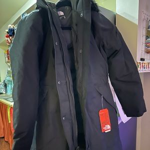 Brand new North Face women’s arctic parka black with tags black faux fur medium